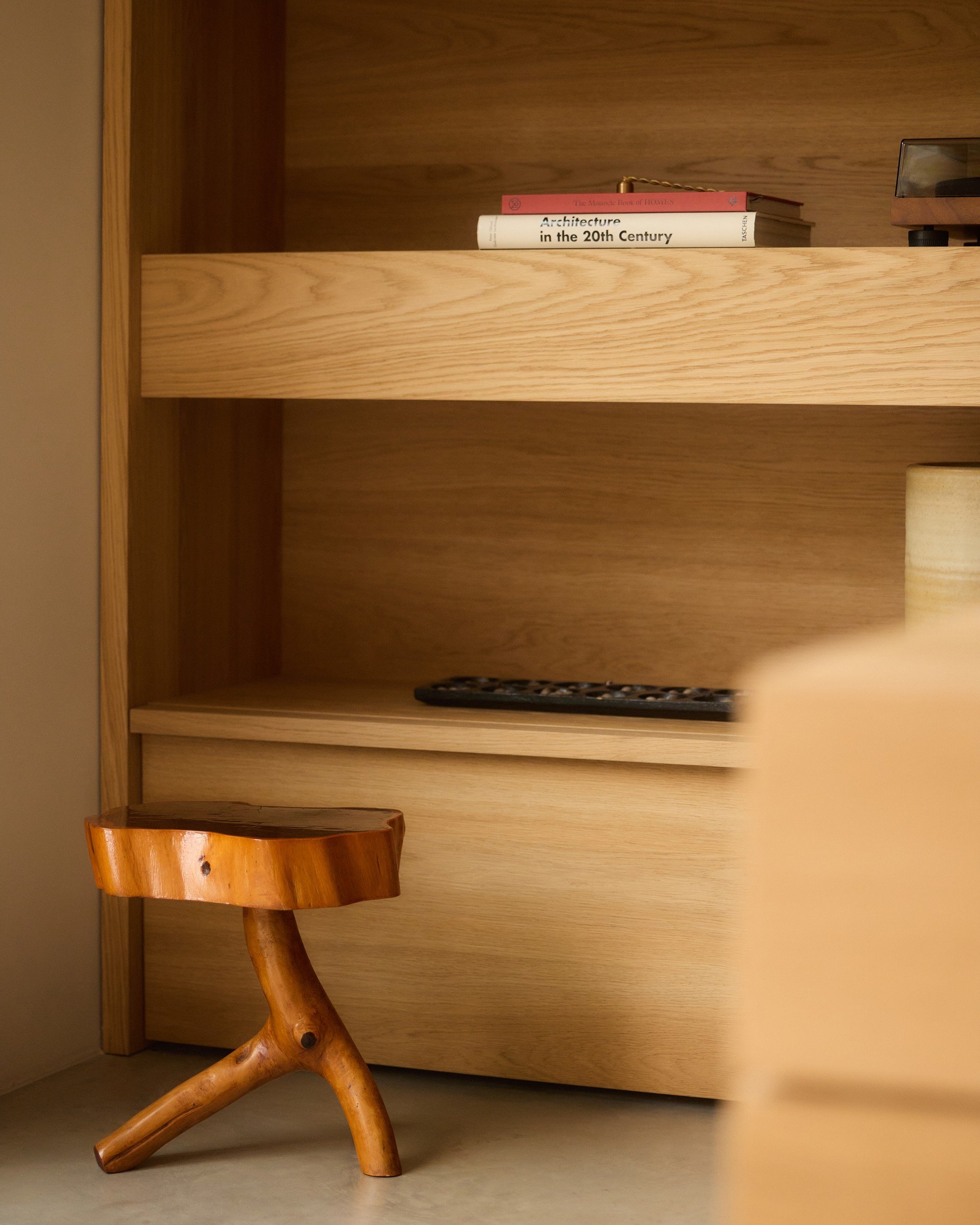 Books and objects on bespoke timber shelving